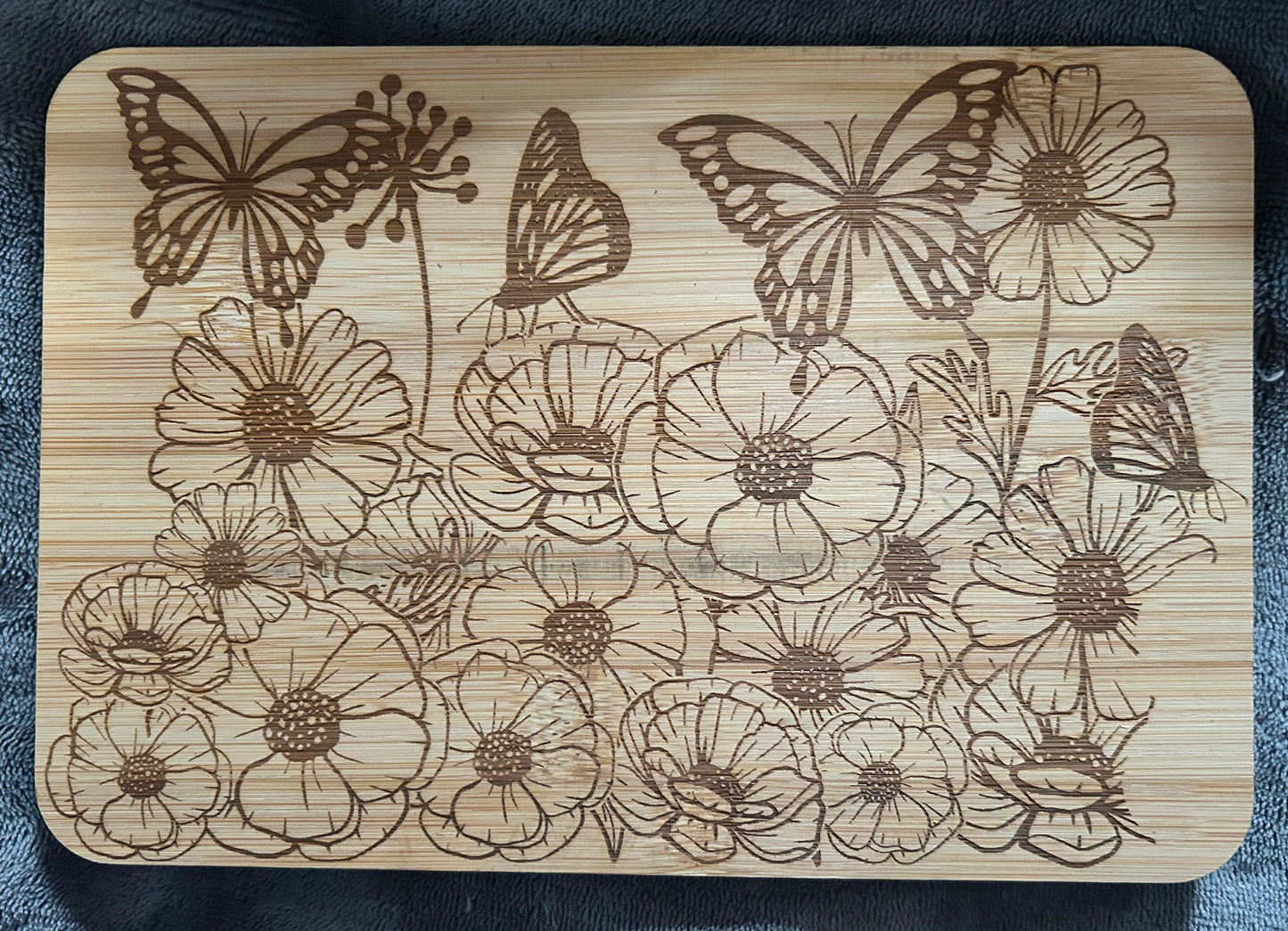 Poppy and butterfly cutting board